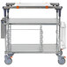 A Metro PrepMate MultiStation cart with galvanized shelving on wheels.