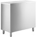 A white rectangular stainless steel Regency dish cabinet with legs.