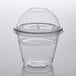 A Fabri-Kal clear plastic parfait cup with a clear lid and clear insert.
