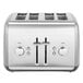 A silver KitchenAid toaster with dials and buttons.