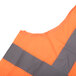 A Cordova orange safety vest with gray stripes and reflective accents.
