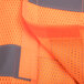 An orange Cordova high visibility safety vest with black trim and hook & loop closure.
