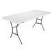 A white rectangular Lifetime plastic fold-in-half table with metal legs.