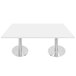 A white rectangular Art Marble Furniture table with silver legs.