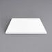 A white square Art Marble Furniture Winter White Quartz Tabletop on a gray background.