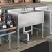 A Regency stainless steel underbar sink with a right drainboard on a counter.