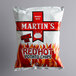 A Martin's bag of red hot potato chips.