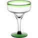 An Acopa Tropic margarita glass with a green rim and base.
