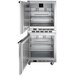 A stainless steel Beverage-Air undercounter freezer with two left hinged doors open.