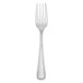 A Walco stainless steel salad fork with a beaded design on the handle.