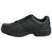 A black leather Genuine Grip steel toe shoe for women with a lace up closure.