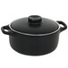 A black stoneware ovenware dish with a lid with a black handle.