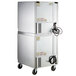 A Beverage-Air stainless steel double stacked glass door undercounter freezer and refrigerator with wheels.