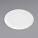 A white porcelain oval coupe plate with a spiral pattern.