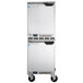 A stainless steel Beverage-Air undercounter refrigerator with wheels.