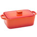A red rectangular Front of the House stoneware ovenware dish with a lid.