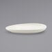 A close up of a white Front of the House porcelain oval plate.