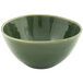 A close up of a green Front of the House Kiln oval tall porcelain bowl.