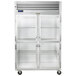 A Traulsen G Series reach-in refrigerator with glass half doors.