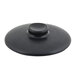 A black round stoneware lid with a round cap.