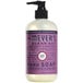A bottle of Mrs. Meyer's Plum Berry scented hand soap with a purple label and pump.