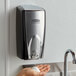 Rubbermaid FG750411 Autofoam 1100 mL Black / Chrome Automatic Hands-Free Soap Dispenser Main Thumbnail 1
