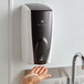 Rubbermaid FG750138 Autofoam 1100 mL White / Black Pearl Automatic Hands-Free Soap Dispenser Main Thumbnail 1