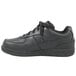 A black leather Genuine Grip women's classic sport shoe with laces.