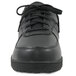 A close-up of a black Genuine Grip 210 women's shoe with laces.