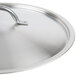 A close-up of a Vollrath stainless steel domed lid with a handle.