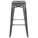 A Flash Furniture distressed silver metal bar stool with a square seat.