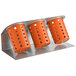 A Steril-Sil stainless steel flatware organizer with three orange perforated plastic cylinders inside.