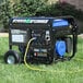 A DuroMax portable generator on a lawn.