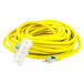 A close up of the yellow DuroMax extension cord with two yellow plugs and a white plug.
