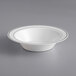 A white bowl with a silver rim.