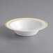 A white plastic bowl with gold bands.