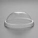 A clear plastic Choice round dome lid on a clear plastic cup.