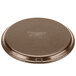 A round brown Carlisle Griptite non skid fiberglass serving tray with text on it.