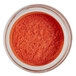 A jar of Roxy & Rich Carrot Lustre Dust, a red-orange powder.