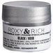A silver container of Roxy & Rich black sparkle dust with a white label.
