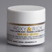 A white container of Roxy & Rich Dark Gold Lustre Dust with a white label and lid.