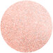 A pink and silver glitter circle with white background.