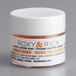 A small white container of Roxy & Rich Sunrise Orange Lustre Dust.