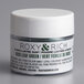 A white Roxy & Rich container of green leaf dye with black text.