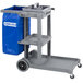 A gray Carlisle janitorial tool caddy for cleaning carts.