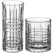 Two Acopa Madras rocks glasses with a checkered pattern.