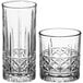Two Acopa Evora glasses with a diamond pattern.