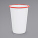 A white Crow Canyon Home enamelware tumbler with red rim.