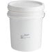 A white 40 lb. pail of Creamy Tahini Paste with a white label and lid.