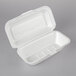Dart 99HT1R 10" x 5 1/2" x 3" White Foam Hoagie Take Out Container with Perforated Hinged Lid - 500/Case Main Thumbnail 3